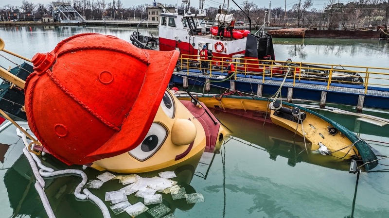 Theodore Too is partially submerged at a dock in Hamilton, Ont., in December 2024. (Courtesy: Bobby Davidson)