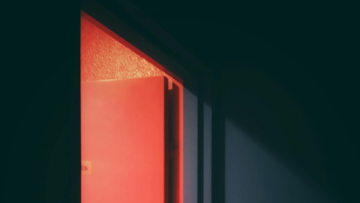 An undated stock image of an open door. (Kei Scampa/Pexels)