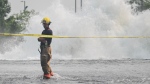 The Canadian Press editors assembled a collection showcasing some of the best photos of the year's most memorable moments and defining events for Canadians.<br><br>
A firefighter stands in one of the many flooded streets of Montreal after a major watermain break on Friday, August 16, 2024. <br><br>

The break left Montreal with a massive cleanup and officials said the main had been one of the city's 'most vulnerable' pieces of water infrastructure. <br><br>


(THE CANADIAN PRESS/Graham Hughes)
