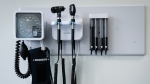 Medical tools are pictured in an exam room at a health clinic in Calgary, Alta., July 14, 2023. (Jeff McIntosh / The Canadian Press)