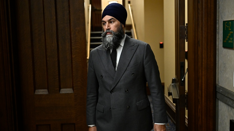 NDP Leader Jagmeet Singh makes his way to speak at a media availability in the Foyer of the House of Commons on Parliament Hill, in Ottawa, on Monday, Dec. 16, 2024. THE CANADIAN PRESS/Justin Tang