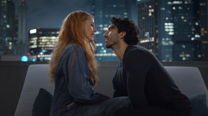 This image released by Sony Pictures shows Justin Baldoni, right, and Blake Lively in a scene from "It Ends With Us." (Nicole Rivelli/Sony Pictures via AP)