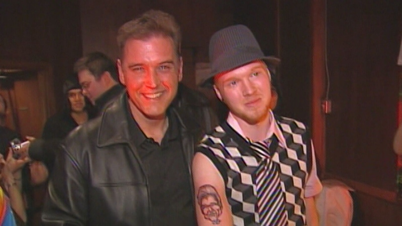 Greg Yorke's shows off his Bruce Frisko tattoo with the man himself. 