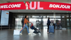 Travellers walk through Montreal-Pierre Elliott Trudeau International Airport in Montreal, Sept. 13, 2024. THE CANADIAN PRESS/Christinne Muschi