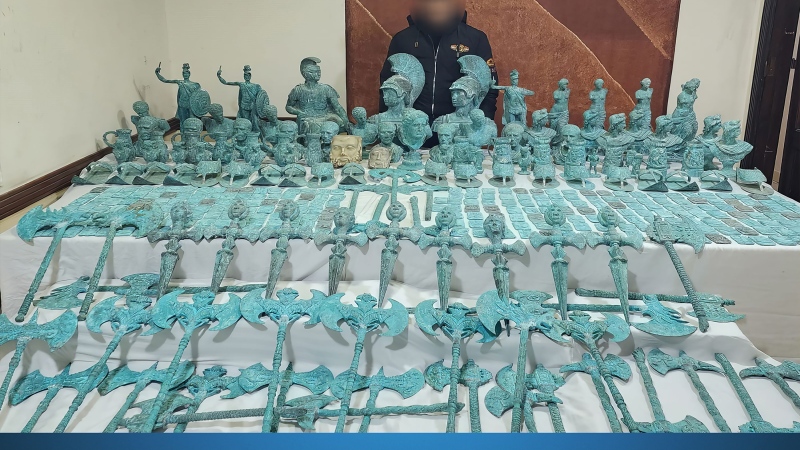 Hundreds of artifacts were seized by Egyptian authorities from two alleged traffickers who had dove to steal the antiquities. (Egyptian Interior Ministry via CNN Newsource)