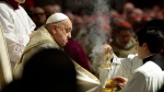 Pope Francis celebrates a Christmas Eve Mass on the day the Pope opens the Holy Door to mark the opening of the 2025 Catholic Holy Year, or Jubilee, in St. Peter's Basilica, at the Vatican, Dec. 24, 2024. (Remo Casilli/Pool Photo via AP)