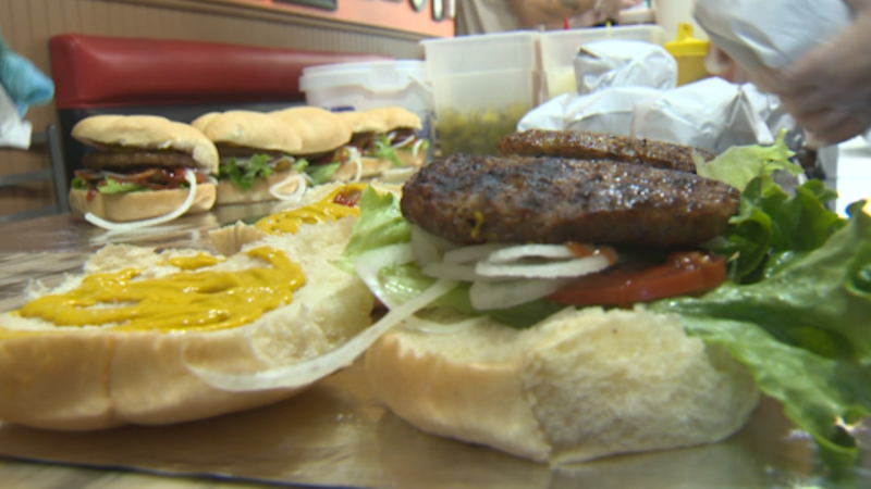 A burger served by Flipp'n Burgers in Calgary on Dec. 24, 2024. (CTV News) 