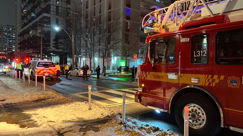 A fire truck responds to an apartment fire in Davisville Village Tuesday December 24, 2024. (Simon Sheehan /CP24) 