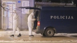 Police investigators work at the site of a shooting in Cetinje, 36 kilometres (22 miles) west of Podogrica, Montenegro, Wednesday, Jan 1, 2025. (AP Photo/Risto Bozovic)