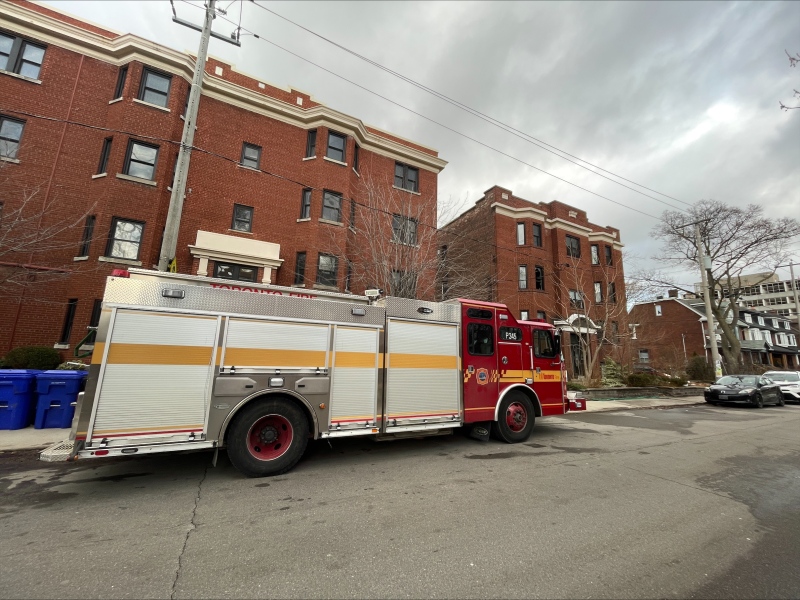 Fire crews are on the scene of a fire at a low-rise apartment building near Bloor and Bathurst streets. (Corey Baird/ CTV News Toronto)