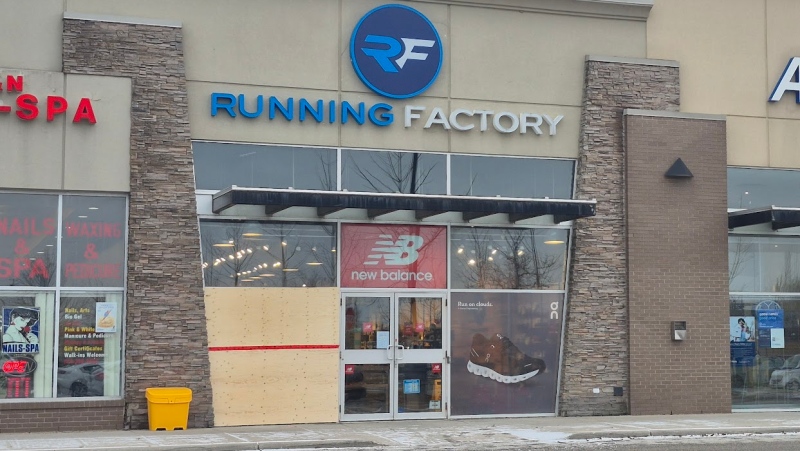 The store window is damaged after a break-in at the Running Factory on Walker Road in Windsor, Ont., on Thursday, Jan. 2, 2025. (Sanjay Maru/CTV News Windsor)