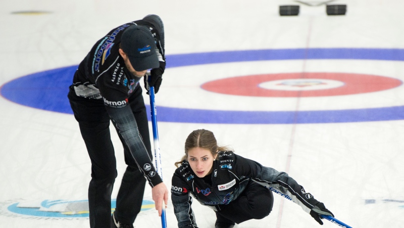 Jaelyn Cotter and her father Jim Cotter in action at the Canadian mixed doubles curling trials in Liverpool, N.S. on Thursday, Jan.2, 2025. (Michael Burns/The Canadian Press)