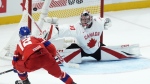 Czechia forward Eduard Sale (12) scores on Canada goalkeeper Carter George (30) during first period IIHF World Junior Hockey Championship quarterfinal action in Ottawa, Jan. 2, 2025. THE CANADIAN PRESS/Adrian Wyld