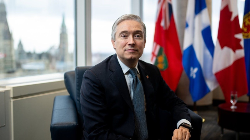 Minister of Innovation, Science and Industry Francois-Philippe Champagne poses for a portrait at his office in Ottawa, on Thursday, Dec. 12, 2024. THE CANADIAN PRESS/Spencer Colby
