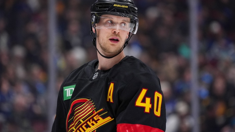 Vancouver Canucks' Elias Pettersson waits for a faceoff against the St. Louis Blues during the second period of an NHL hockey game in Vancouver on December 10, 2024. (Darryl Dyck / The Canadian Press)