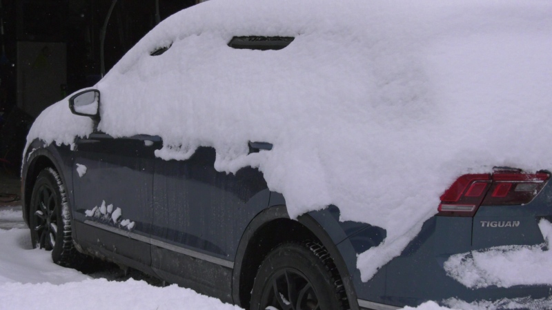 A vehicle covered in snow in Barrie, Ont., on Sat., Jan. 4, 2025 (CTV News/Mike Lang)