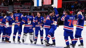 U.S.A. players celebrate following the anthems after winning the IIHF World Junior Hockey Championship gold medal game against Finland, in Ottawa, Jan. 5, 2025. THE CANADIAN PRESS/Sean Kilpatrick