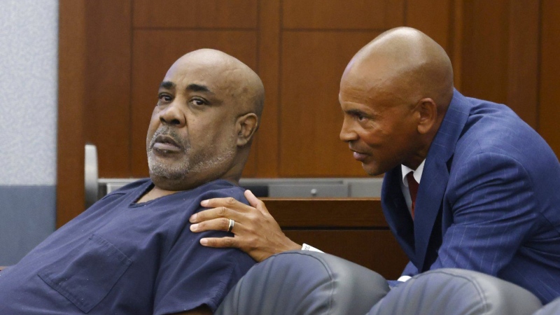 Duane "Keffe D" Davis, left, who is accused of orchestrating the 1996 slaying of hip-hop icon Tupac Shakur, listens to his attorney Carl Arnold during a hearing at the Regional Justice Center, on July 23, 2024, in Las Vegas. (Bizuayehu Tesfaye/Las Vegas Review-Journal via AP, File)