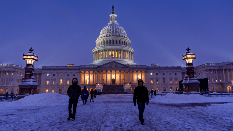 Capitol Hill is serene as snow continues to blanket Washington, Jan. 6, 2025. (AP Photo/J. Scott Applewhite)