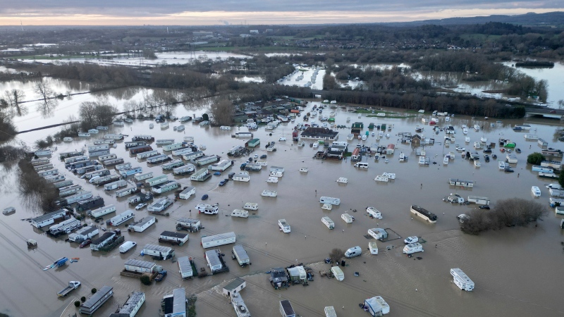 Caravans and cars sit in the floods of the Soar River in Barrow upon Soar, England on Jan. 7, 2025.(Darren Staples / AP Photo)