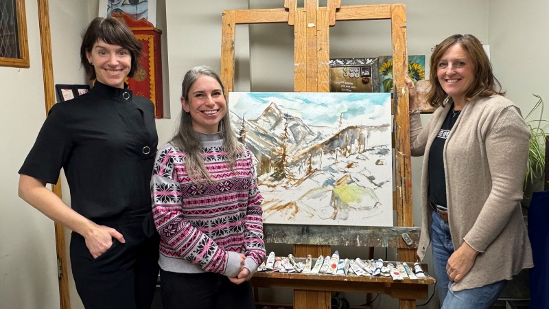 Kim McNeil, Amanda Reber and Michelle Austen (L to R) all hiked into the Rocky Mountains to create a series of landscape paintings as part of a three-week artist residency.