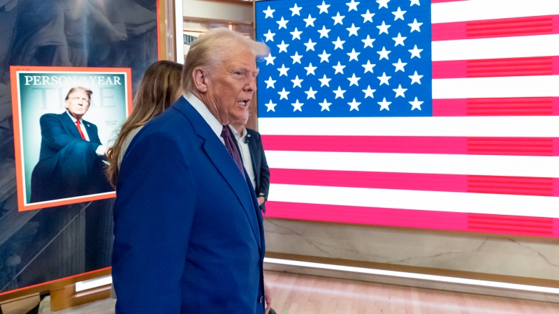 U.S. President-elect Donald Trump arrives on the floor of the New York Stock Exchange after ringing the opening bell on Dec. 12, 2024, in New York (THE CANADIAN PRESS/AP/Alex Brandon)