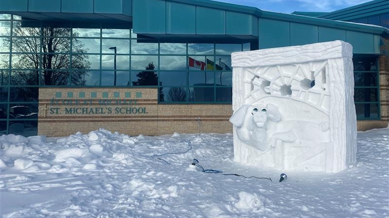 A snow sculpture of "Wilbur" - a character from Charlotte's Web - was carved at an elementary school in Yorkton. (Sierra D'Souza Butts)