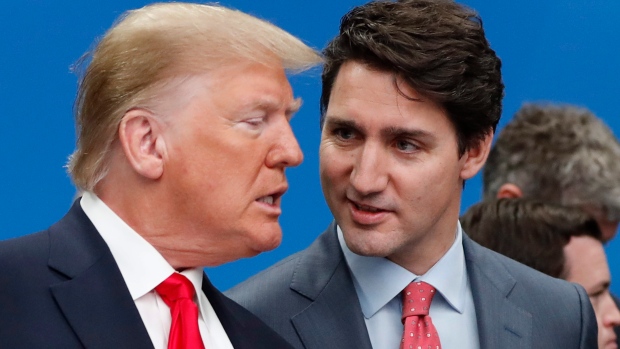 U.S. President Donald Trump, left, and Canadian Prime Minister Justin Trudeau talk prior to a NATO round table meeting in Watford, Hertfordshire, England, Wednesday, Dec. 4, 2019. (Frank Augstein/AP Photo)