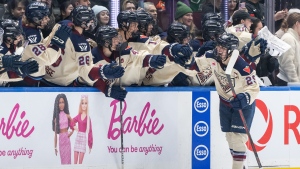 Montreal Victoire Marie-Philip Poulin (29) is congratulated after scoring a goal during a PWHL game against the Toronto Sceptres in Vancouver on Jan. 8, 2025. (LA PRESSE CANADIENNE/Ethan Cairns)