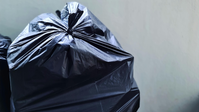 A Cochrane, Ont., man was fined $1,001 for dumping a single bag of garbage on public land, a violation under the Public Lands Act. A single black garbage bag is shown. (File photo)