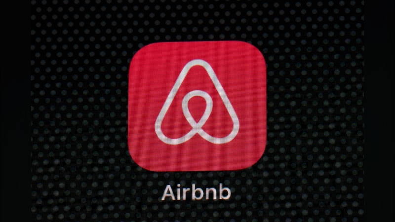 The Airbnb app icon is displayed on an iPad screen in Washington, D.C., on May 8, 2021. (AP Photo/Patrick Semansky)