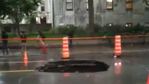 A sinkhole appeared near McGill campus on Tuesday minutes after tens of thousands marched past.