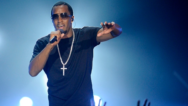 Hip-hop entrepreneur Sean "Diddy" Combs performs at Caesars Entertainment's "Escape to Total Rewards" kick-off at Gotham Hall on Thursday, March 1, 2012 in New York. (AP Photo/Evan Agostini)