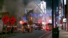 Firefighters fighting a six-alarm blaze near Yonge and Gould Streets on Jan. 3, 2011.