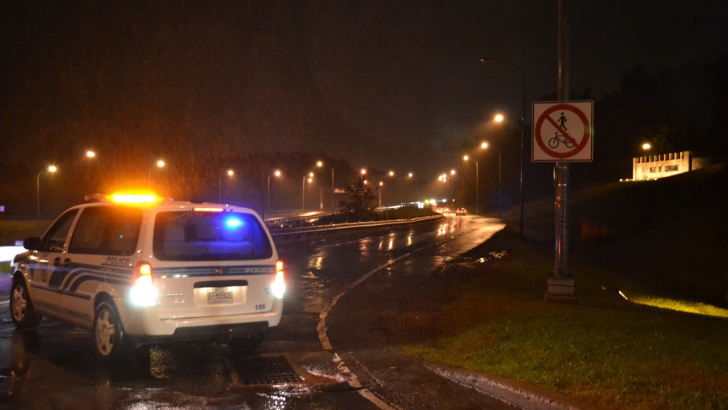 Police block road leading to Highway 640 following dead(CTV Montreal/Cosmo Santamaria, Oct. 1, 2012)